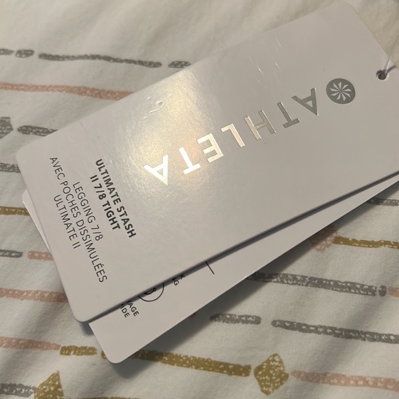 Athleta Ultimate Stash Tight 7/8 - Picture 2 of 2